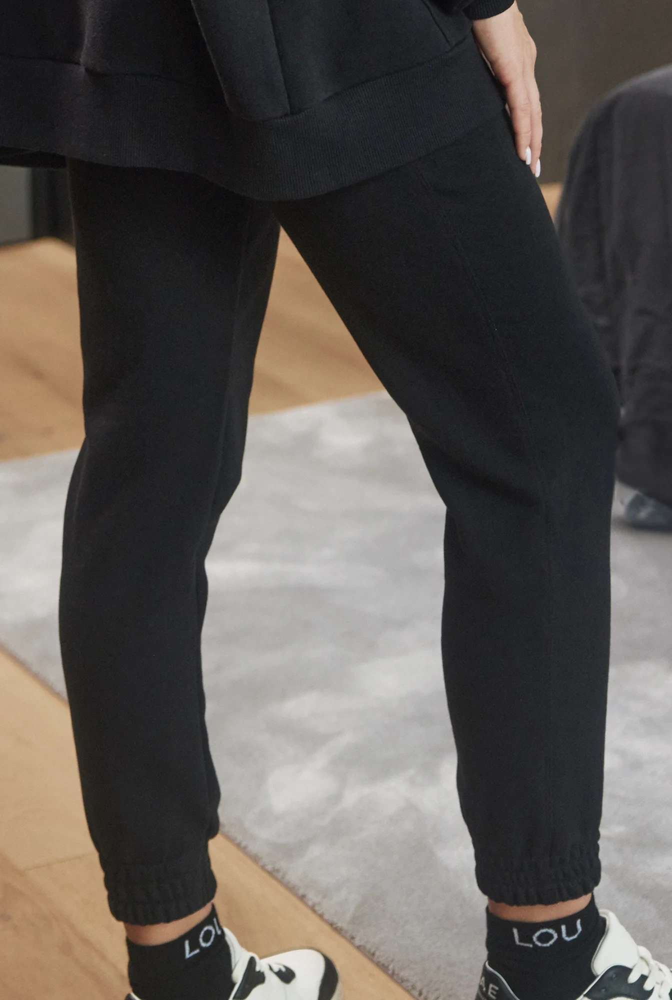 Saura Black - black, comfortable pants with a logo