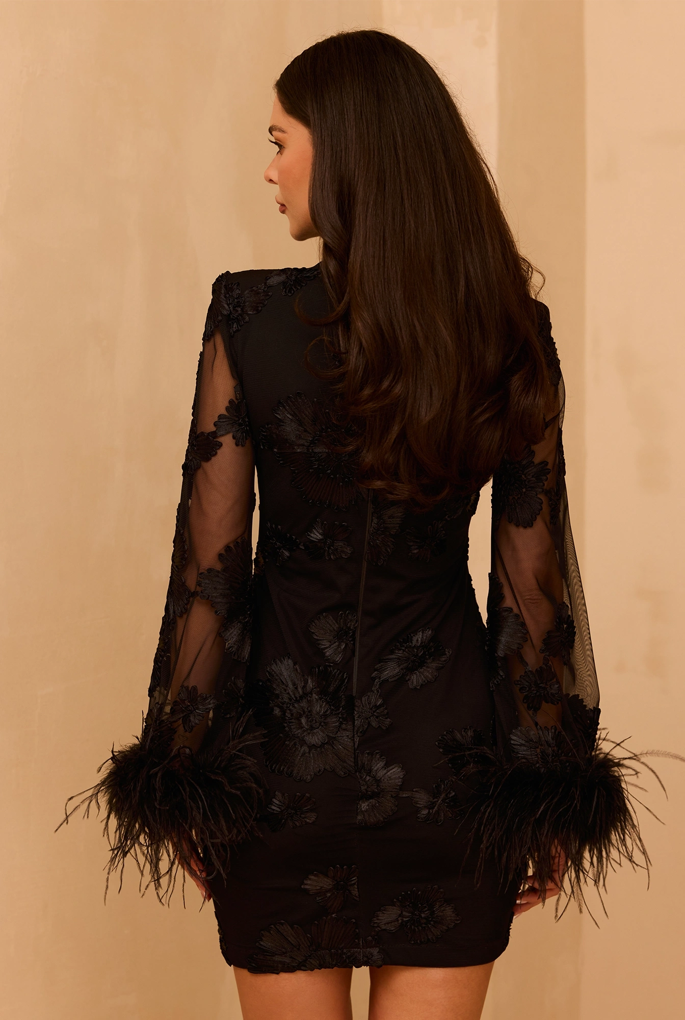 Unella – black mini dress with feathers
